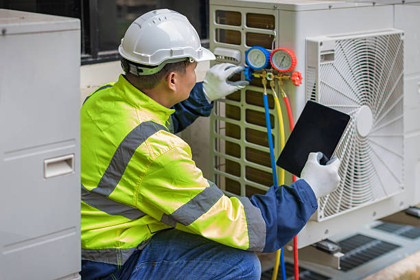 Professional Air Duct Cleaning technician working in South Vienna, OH
